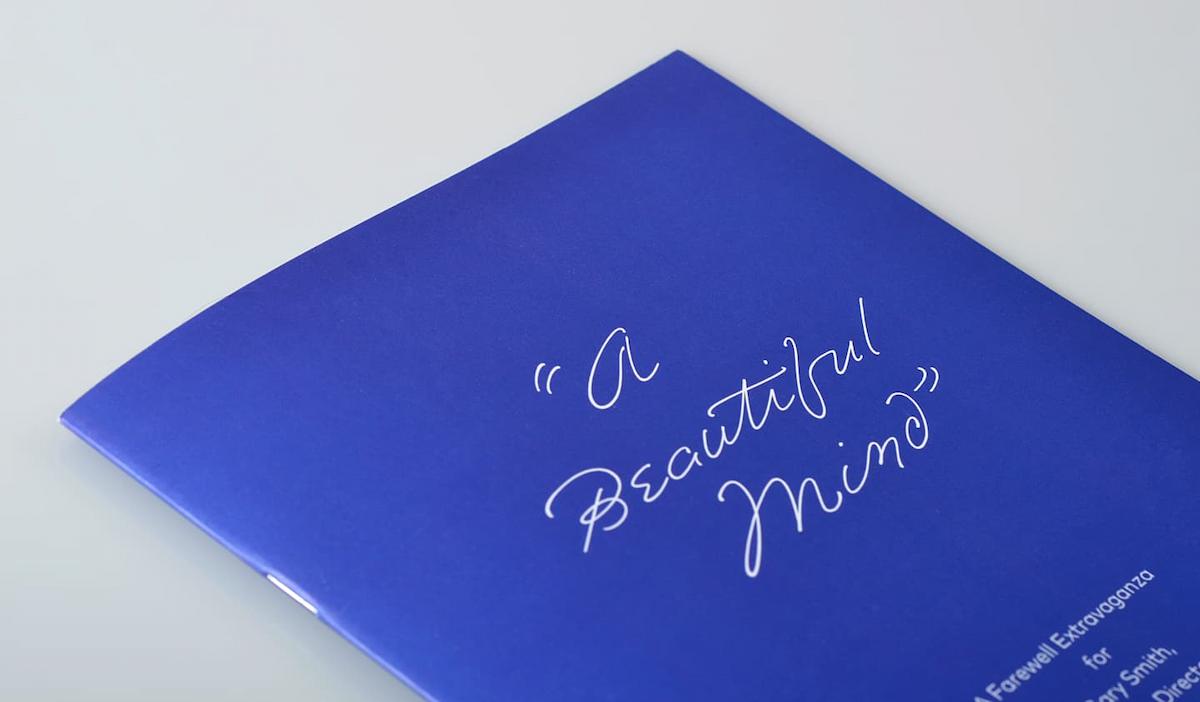 Emily In White typeface on “A Beautiful Mind” invitation